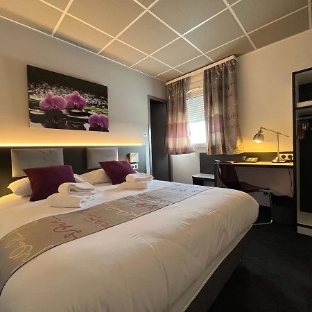 Brit Hotel Le Vesoul Bagian luar foto